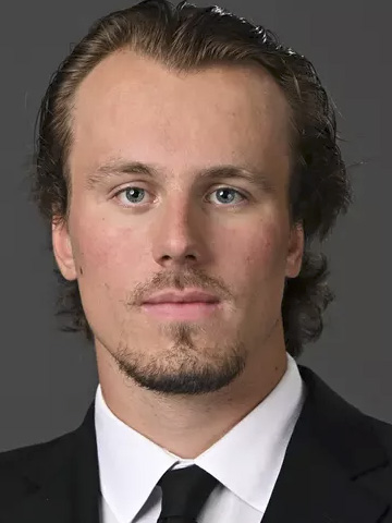 Tanner Komzak headshot